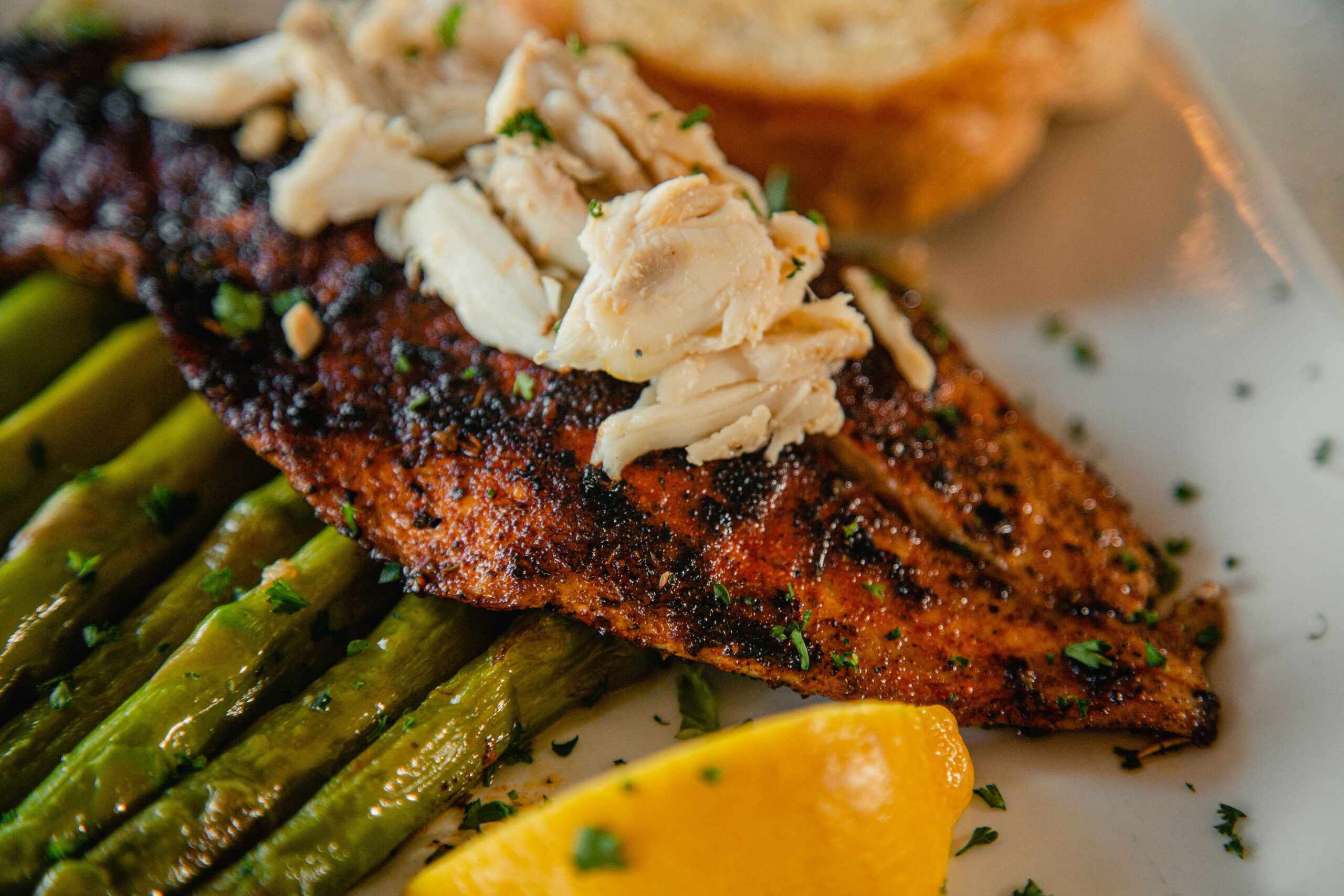 Blackened Redfish with Jumbo Lump Crabmeat over Asparagus